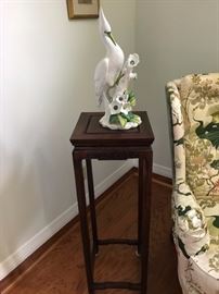 Plant stand and figurine