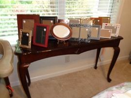 pair of sofa tables but they don't match