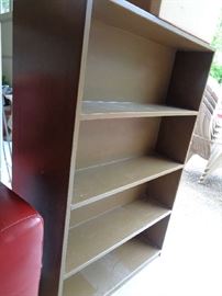 the 2 bookcases have shelves on each side, be a good room divider