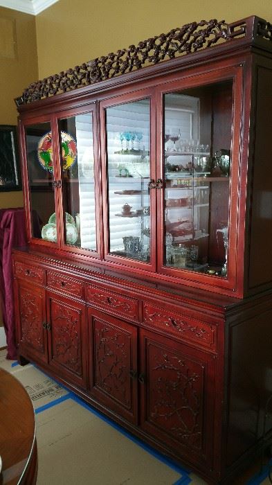 Asain China cabinet with carved details