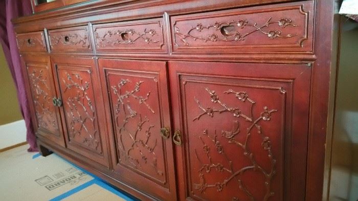 Carved detail on cabinet doors