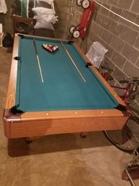 7 foot x 4 foot Pool Table ,Return Pockets.Cues(sticks) & full set of pool balls!