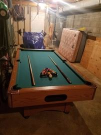 7 foot x 4 foot Pool Table ,Return Pockets.Cues(sticks) & full set of pool balls!