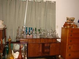 Mid-Century Modern piece covered with a small sample of the decanter collection