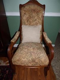 Antique arm chair with carved grape crest