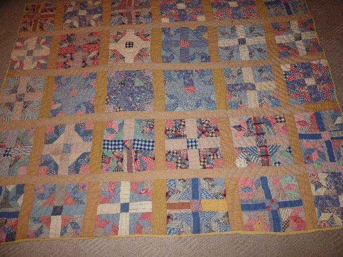 Vintage fabric hand stitched quilt