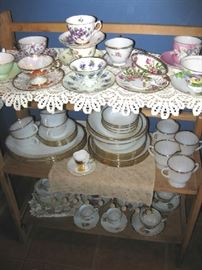 Cups and saucers. Full set of Fire king Anniversary pattern, never used, gold trim is perfect.