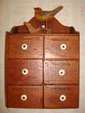 Solid wood spice container mounts to the wall. There is another matching container for additional spices. Sold as a pair of two only. The bird is sold separately and is not attached to the container.