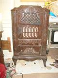 Coal burning stove not hooked up, circa early 1900's