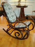 Probably the most comfortable piece of furniture in the home.
This bent wood and upholstered rocker is a pretty as it is comfortable. Perfect for grandma or grandpa when it's story time with your grandchildren or parents looking for a comfortable way to give the baby their bottle or just relax and read a book for yourself.