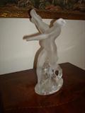 Two Nude Figures In Dance. One of two exceptionally beautiful Lalique carved and polished glass sculptures.
Rene' Lalique was a French designer who was lucky enough to be born, live and work in perhaps the greatest time for artists . . . 1860 - 1945. Impressionism, Expressionism, Abstract, cubism, realism. Lalique was influence by all. His original works are unique pieces of art represent in collections of fine museums all over the world.
His studio lives on and his unique pieces sell for thousands and some for tens of thousands of dollars. The owner has two exceptionally beautiful and rare pieces for sale. The price for each is considerable. But then, owning a unique piece of art and history always is.