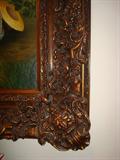 Detail shot showing the exceptional detail filigree work in the hand-carved frame. Trying finding the corner joints in this one. Good luck!
In life as in art, you get you pay for.
