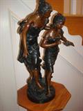 One of the many Rococo-styled original brass sculptures throughout this home. This is an absolutely exquisite piece.