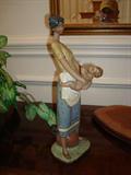 A Lladro piece and another fine example of the art and collectibles in this home