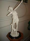 There are many fine Rococo styled original and cast sculptures throughout this home.