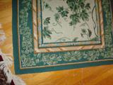 Detail of another of splendid Persian rugs throughout the home.