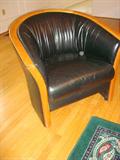 An Original leather and bent wood "Bell" chair. If new this chair would retail for over $1,500.