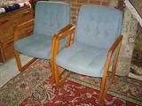Matching sled-based upholstered pull up chairs