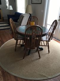 rug and table and chairs