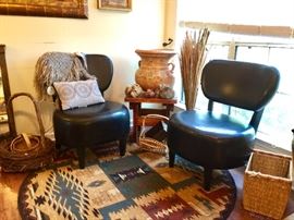 Black Leather chairs, in excellent condition. Southwestern area rug , decor & small table also for sale.