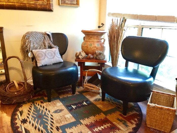 Black Leather chairs, in excellent condition. Southwestern area rug , decor & small table also for sale. 