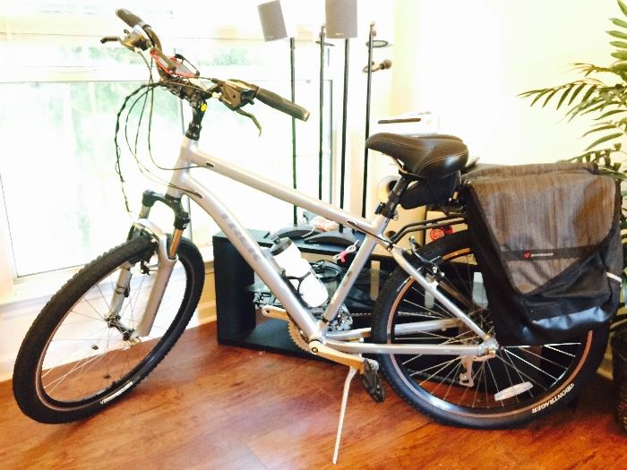 ** This item is also posted for online sale and may be sold at any time. Please serious inquiries, call. May or may not still be available date of sale. Trek Shift 4 bicycle with waterproof bag, and other added accessories. Peddler Bike Shop product. 