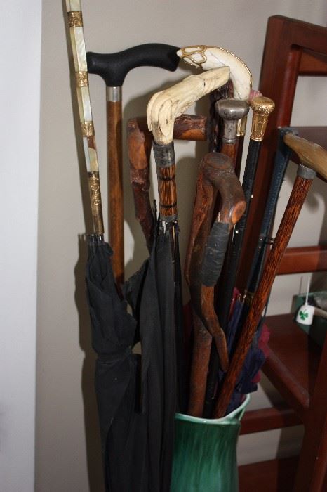 Collection of antique canes, some with 14K gold