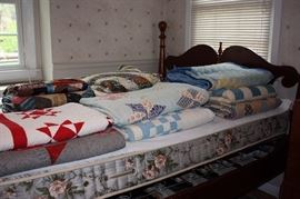 Antique bed, quilts/ Antique bed...notice the springs