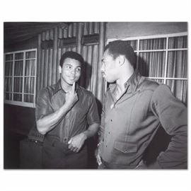Muhammad Ali and Ken Norton Licensed Photograph: A licensed photograph on Kodak photo paper depicting boxer Muhammed Ali and Ken Norton. Presents unframed.
