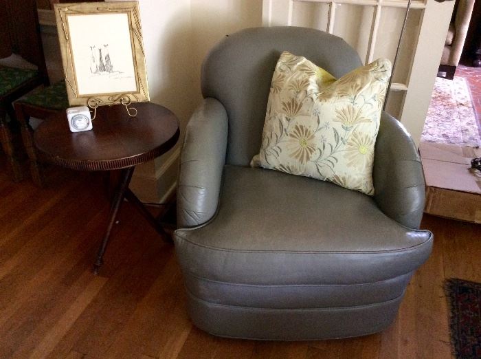 Swivel grey leather chair