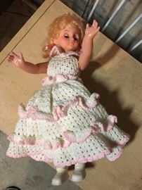 Vintage doll with crocheted dress