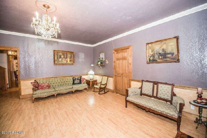 can you see the chandelier original to the house for sale?  
