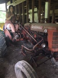 Farmall Super A 1953 tractors with crank or battery start--has all of the implements original to the tractor---Plus this one comes with an 1950's era Bush Hog
