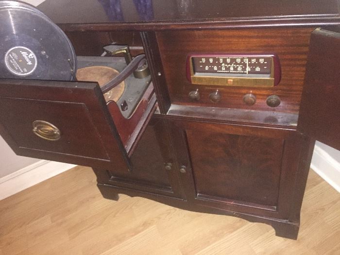 Vintage record player with old records
