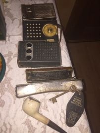 Everything they needed for a happy Cajun life-pipes, radios, harmonicas and a 1940s key to the old Lafayette Gordon Hotel