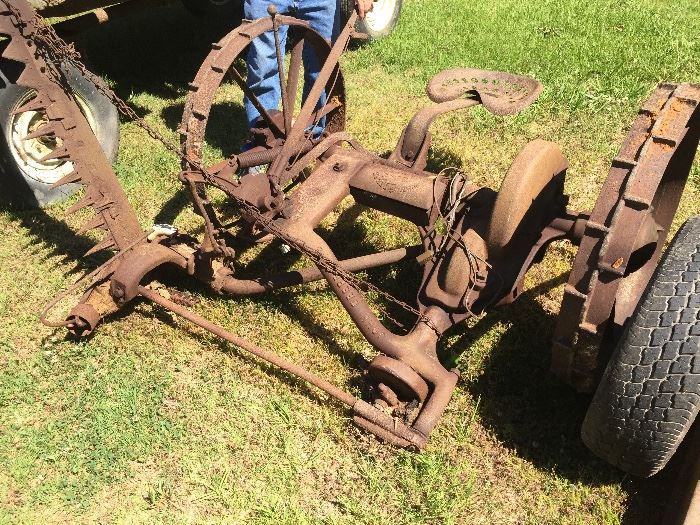 so much OLD farming equipment including this Horse driven John Deere sickle mower