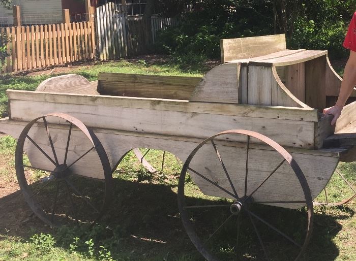 So much! Including this sturdy buckboard with original metal wheels