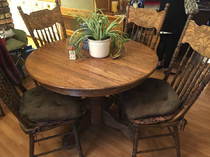 cute antique pedestal oak table with four early chairs