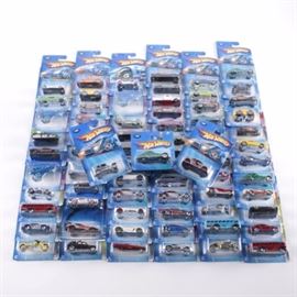 Hot Wheels Die-Cast Car Collection: A Hot Wheels die cast car collection. The collection include seventy two cars from the late 20th and early 21st century. All the cars are in unopened original boxes and some are firtst editions. The collection includes White Heat , Blings , Final Run , Dodge Magnum and more.