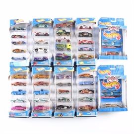 Hot Wheels Car Collection: A Hot Wheels car collection. Included are eight multipacks and two final production models. Each of the eight packs contains five cars in a variety of styles, makes, and models.