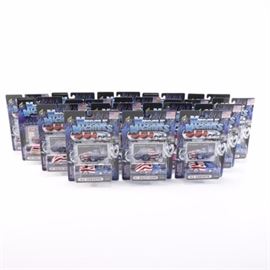 Muscle Machines Die-Cast Toy Car Collection: A collection of seventeen Muscle Machines die-cast toy cars. The selection features a 1963 Corvette, 1941 Willy’s Coupe, 2000 PT Cruiser, 1970 Cuda, and more. The cars’ scales vary, but are listed on the front of the packaging.
