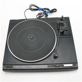 Kenwood Turntable: A Kenwood automatic return turntable, model KD-42RB and serial number 46L40944. Includes power cord and audio cords.
