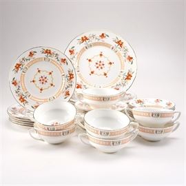 Royal Worchester "Chamberlain" Dining Set: A selection of thirty-seven pieces of Royal Worchester Chamberlain dining china. Included are seven soup bowls, six dinner plates, six salad plates, seven fruit bowls, and eleven mug saucers. Each is decorated with gold tone trim and red flowers in a border around the rim with a secondary gold tone border towards the center, which is decorated with more floral motifs in red and yellow.