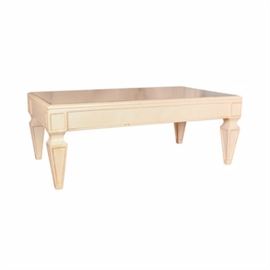 Directoire-Style Coffee Table: A Directoire-style coffee table. This coffee table has a rectangular shape with a painted cream finish, gold-tone accents, and tapered legs. Piece features no apparent maker’s marks.