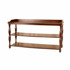 Jacob Freres-Style Sofa Table: A Jacob Freres-style sofa table. This sofa table features three shelves, turned legs and is in a rectangle shape. This piece is in a satin mahogany finish and is unmarked.