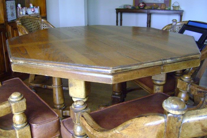 Heavy solid dining table with 4 chairs, measures 44".  Includes one 12" table leaf.