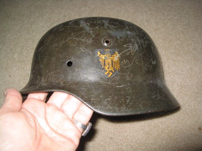 WWII German shell helmet and appears to be a navy decal.