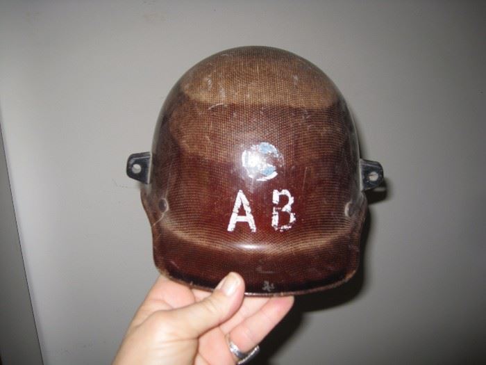 This wood helmet marked AB is the liner to a helmet