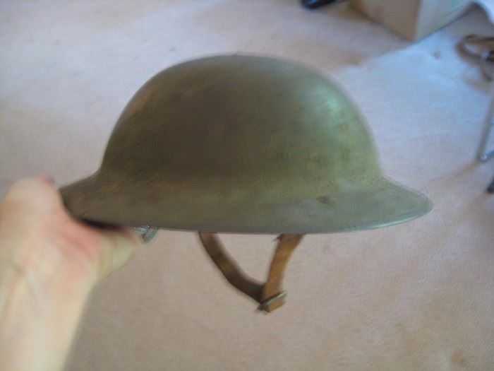 WW1 metal helmet made by a British manufacturer.