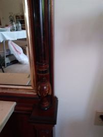 Large pier mirror accent at base of mirror